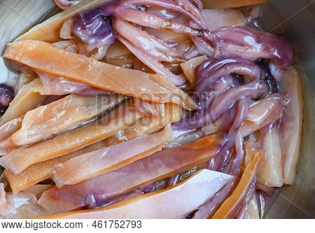 Raw Squid For Cooking Food On Wooden Table, Preserving Food Seafood, Pickled Squid On Bowl