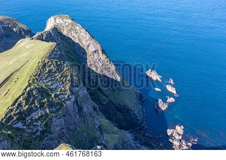 Aerial View Of The Cliffs Near The Lighthouse On The Island Of Arranmore In County Donegal, Ireland