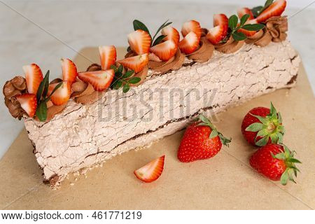 Strawberry Roulade. Gastronomy. Sponge Roll Stuffed With Strawberry Cream. Homemade Cake Roll With S