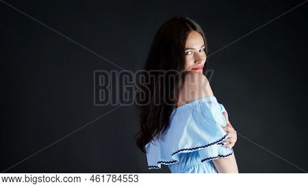 Portrait Of A Sexy Brunette Woman With Red Lips Who Eroticly And Playfully Moves And Looking Sexuall