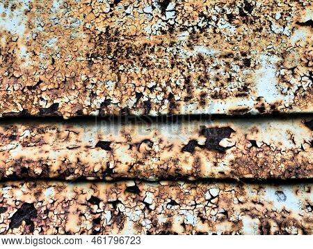 A Closeup Shot Of A Rusty Metal Surface. Corosion.
