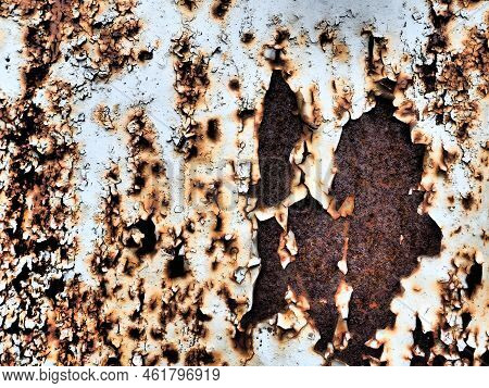 A Closeup Shot Of A Rusty Metal Surface. Corosion.