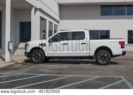 Ford F-150 Lightning Display. Ford Offers The F150 Lightning All-electric Truck In Pro, Xlt, Lariat,
