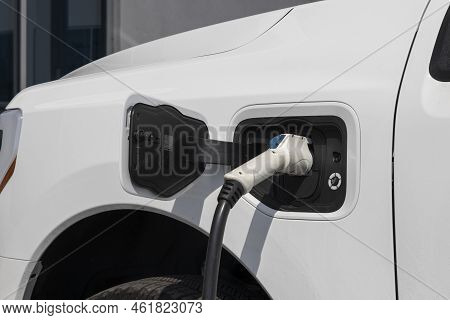 Ford F-150 Lightning Display. Ford Offers The F150 Lightning All-electric Truck In Pro, Xlt, Lariat,
