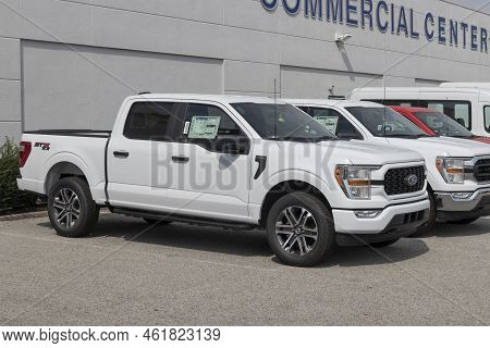 Ford F-150 Display At A Dealership. The Ford F150 Is Available In Xl, Xlt, Lariat, King Ranch, Plati