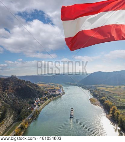 Panorama Of Duernstein Village With Ship On Danube River During Autumn In Austria, Unesco