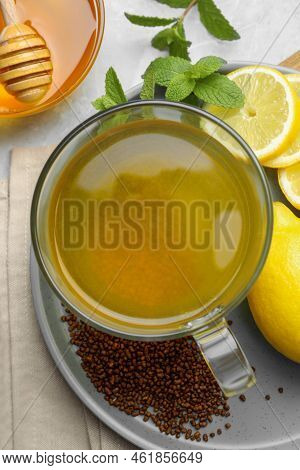 Buckwheat Tea, Lemon And Honey On Light Grey Marble Table, Flat Lay