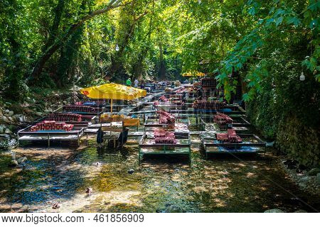 Ulupinar, Turkey - September 9, 2022: Tropic Restaurants On The River. Places On The River With Tour