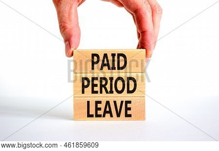 Paid Period Leave Symbol. Concept Words Paid Period Leave On Wooden Blocks. Beautiful White Table Wh