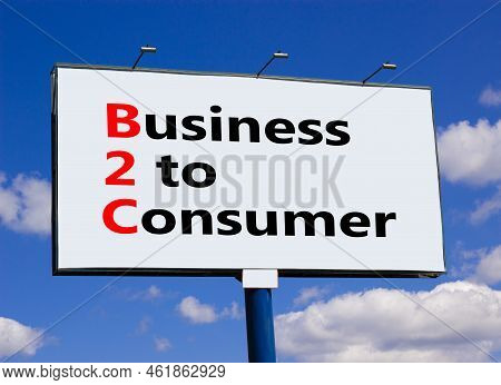 B2c Business To Consumer Symbol. Concept Words B2c Business To Consumer On White Billboard Against B