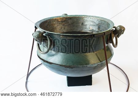 The Cauldron Is Decorated By Four Cast Heads Of Germanic Men Wearing A Suebian Knot Hairstyle That A