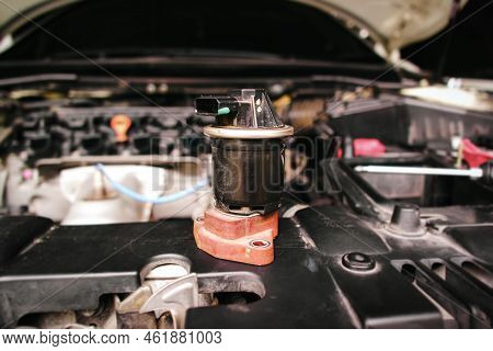 Close Up Of The Old Broken Egr Exhaust Gas Recirculation In The Engine Compartment, Automotive Part 