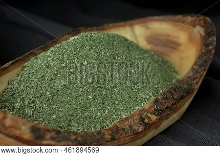 Dried Chopped Provence Herbs In A Wooden  Bowl