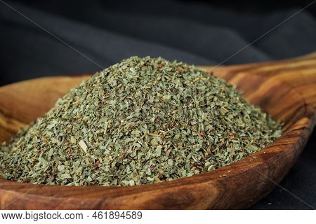 Dried Chopped Provence Herbs In A Wooden  Bowl