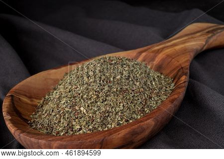 Dried Chopped Provence Herbs In A Wooden  Bowl