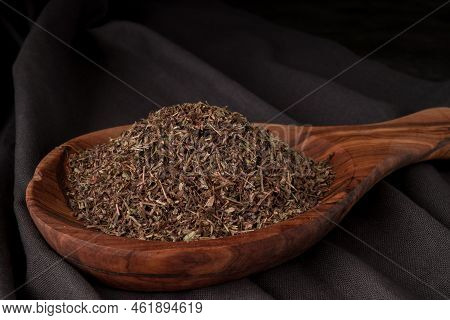 Dried Chopped Provence Herbs In A Wooden  Bowl