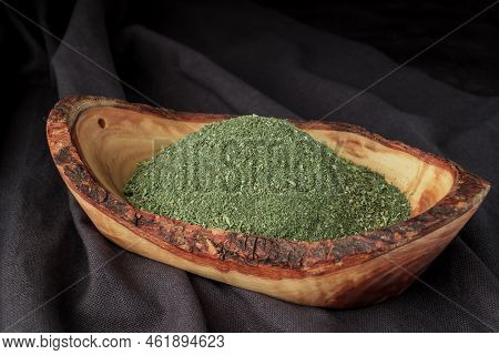 Dried Chopped Provence Herbs In A Wooden  Bowl