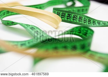 Green Centimeter - A Tailor's Tool For Measuring When Sewing. A Centimeter Is A Tool For Measuring D
