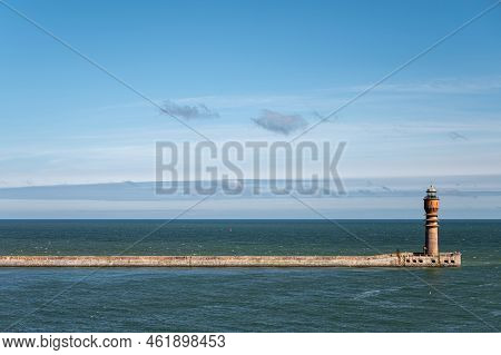 Europe, France, Dunkerque - July 9, 2022: Feu De Saint Pol, Light Tower, At End Of Its Pier Seen Fro