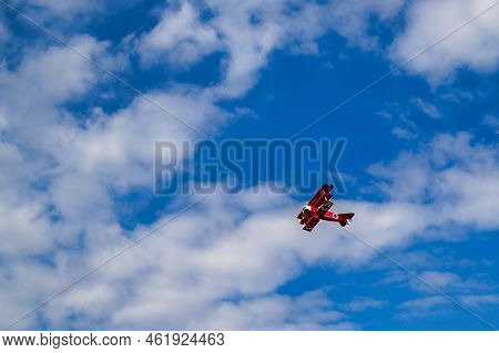 A Triplane For The Air Show At An Old Airfield