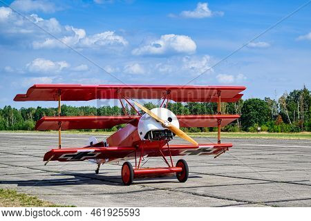 A Triplane For The Air Show At An Old Airfield