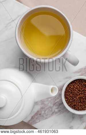 Freshly Made Buckwheat Tea And Granules On Table, Top View