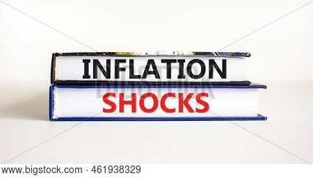 Inflation Shocks Symbol. Concept Words Inflation Shocks On Books. Beautiful White Table White Backgr