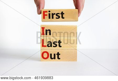 Filo First In Last Out Symbol. Concept Words Filo First In Last Out On Wooden Blocks. Beautiful Whit