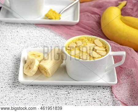 Mini Cake. Breakfast In A Mug. Homemade Portioned Banana Mugcake In Small Mugs.