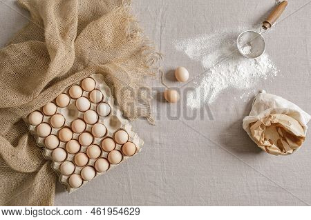 Fresh Organic Chicken Eggs In Carton Pack Or Egg Paper Container On A Sacking. Zero Waste Packaging 