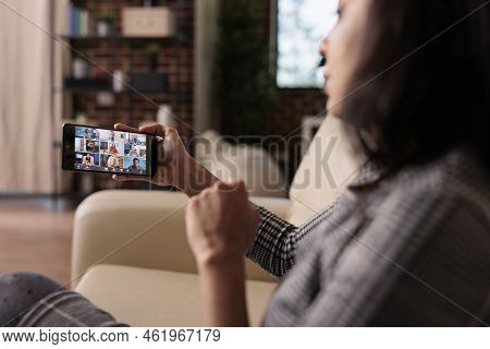 Freelancer Using Smartphone With Online Videocall Conference To Talk To Colleagues On Webcam. Chatti