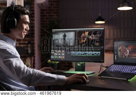 Male Videographer Editing Movie Footage With Media Software, Working On Film Montage Production. Cre