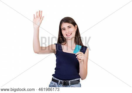 Excited Young Woman Greets Lifting Hand Up, Highfive Gesture While Holding A Credit Card In Hand, Is