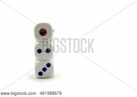 Three Plastic Dice Isolated On A White Background, A Dice Is A Small Object Generally In The Shape O