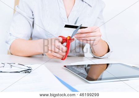 Businesswoman Cutting Credit Card