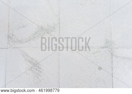 Polymeric Paver Sand On Top Of Gray Concrete Patio Stone Paver Brick Walkway In Texas, Usa