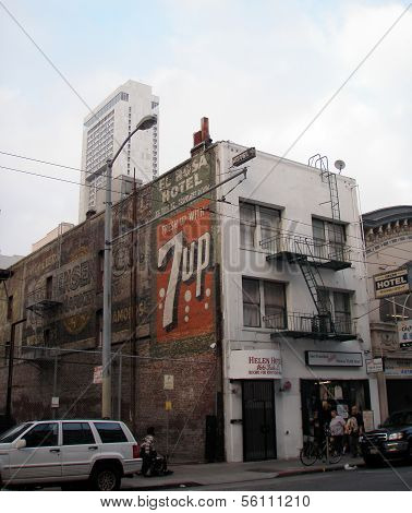 A Historic 7Up Ghost Sign And A Ghost Sign For The El Rosa Hotel On Side Of Helen Hotel