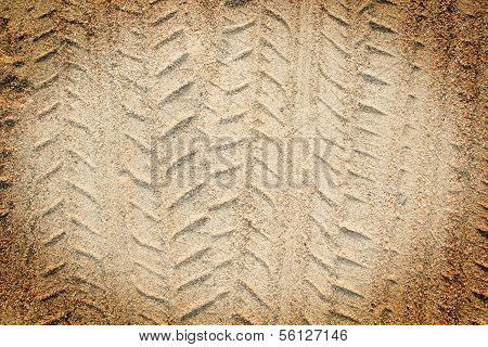 Detail of tyre tracks in sand desert