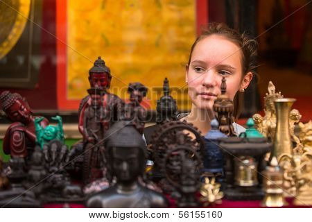 Teengirl in a souvenir shop in Kathmandu. 
