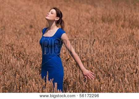 Beautiful Young Woman With Pretty Dress Kisses The Warm Summer Sun