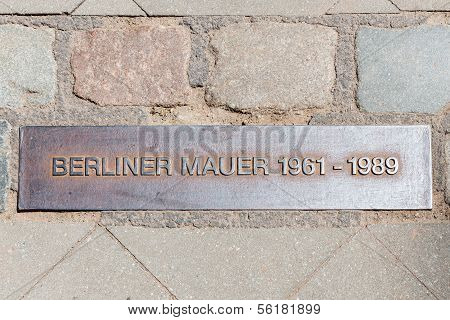 Iron Plaque Of The Berliner Wall Near Checkpoint Charlie