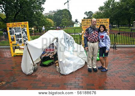 Man Is Demonstration In Front Of The White House In Rain For Peace And Against Nuclear Wapons