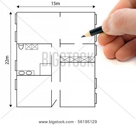 A draftsmans hand sketching a ground plan.