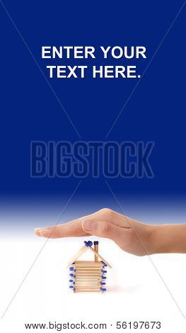 A human hand protecting a stylized house out of matchsticks. All isolated on white background.