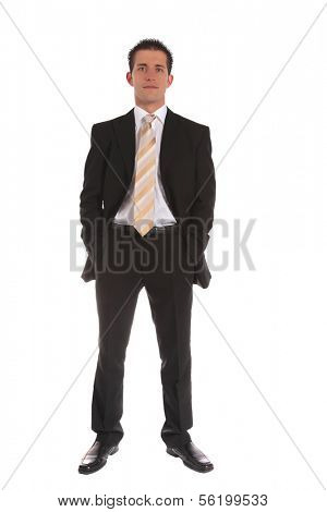 An ambitious businessman standing in front of a white background.