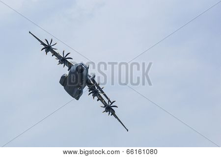 BERLIN, GERMANY - MAY 20, 2014: Four-engine turboprop military transport aircraft Airbus A400M (France) demonstration during the International Aerospace Exhibition ILA Berlin Air Show-2014.
