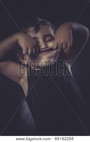 derision, boy dressed rocker with funny faces