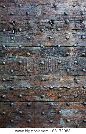 Old, Brown Wooden Surface With Metal Knobs