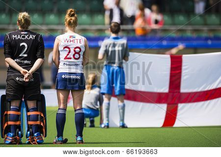 THE HAGUE, NETHERLANDS - JUNE 1: The English hockey team is lined up with their flag during the Hockey World Cup 2014 (woman)