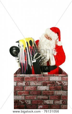 Santa Claus in a Chimney. Santa Claus enters a house through a chimney to deliver a Pedal Car as a Christmas Present to some lucky little boy or girl. Christmas time is enjoyed by people everywhere.